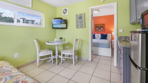 Basic Suite, 1 Bedroom, Kitchenette | Living area | 32-inch flat-screen TV with digital channels, TV, streaming services