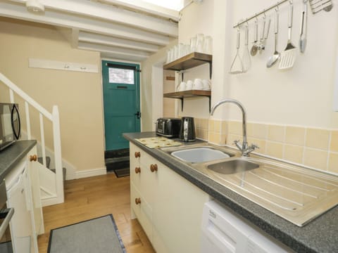 Fridge, electric kettle, toaster, cookware/dishes/utensils