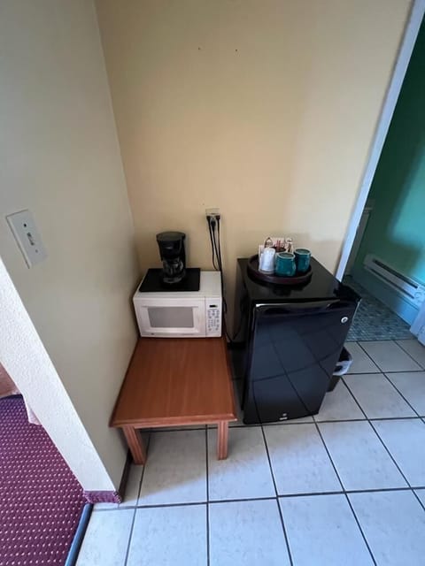 Standard Single Room | Blackout drapes, iron/ironing board, free WiFi, bed sheets