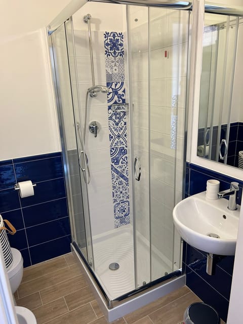 Junior Room, 1 Large Twin Bed, City View, Tower | Bathroom | Shower, hair dryer, towels