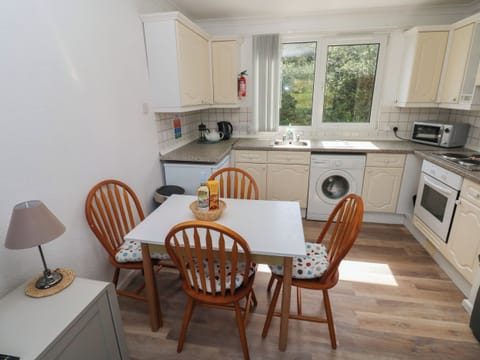 Fridge, electric kettle, toaster, cookware/dishes/utensils