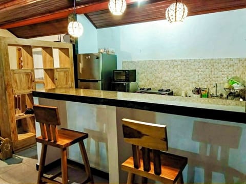 Family Triple Room | Private kitchen | Fridge, microwave, oven, stovetop