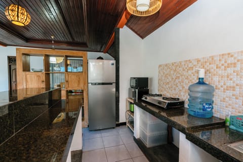 Family Triple Room | Private kitchen | Fridge, microwave, oven, stovetop