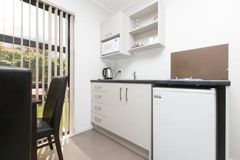 Mini-fridge, microwave, stovetop, electric kettle