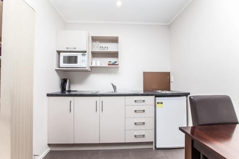 Mini-fridge, microwave, stovetop, electric kettle