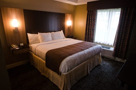 Deluxe Room, 1 King Bed | Desk, iron/ironing board, free WiFi, bed sheets