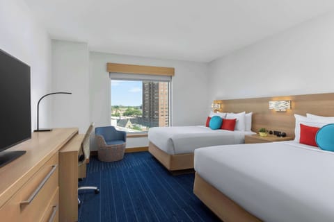 Premium bedding, down comforters, in-room safe, desk