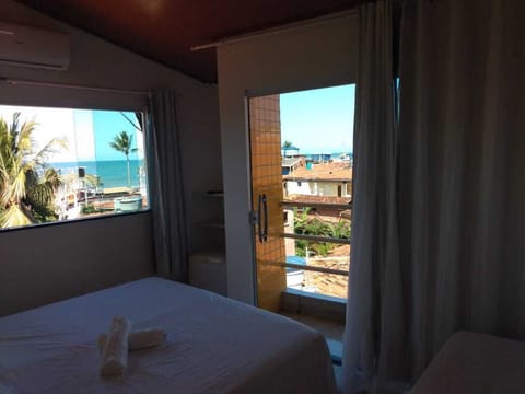 Panoramic Triple Room, Patio, Sea View | Minibar, free WiFi, bed sheets