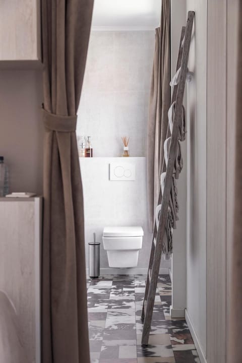 Shower, rainfall showerhead, designer toiletries, hair dryer