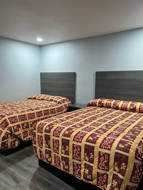 Desk, laptop workspace, free WiFi, bed sheets