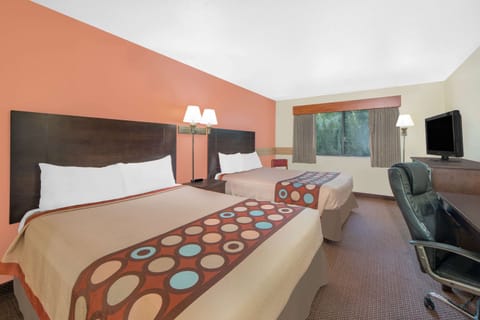 Desk, blackout drapes, iron/ironing board, free cribs/infant beds