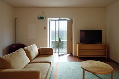 Superior Suite | Living area | 43-inch Smart TV with digital channels