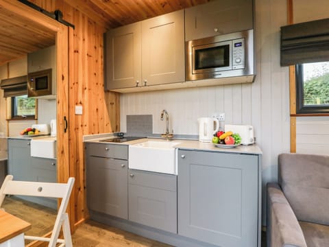 Fridge, electric kettle, cookware/dishes/utensils