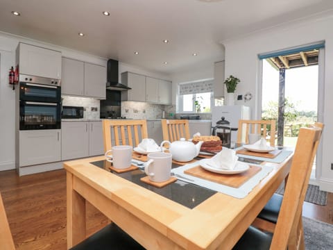 Fridge, electric kettle, toaster, cookware/dishes/utensils