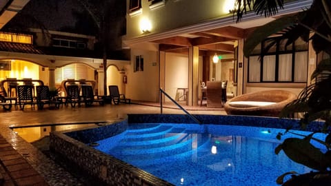 Outdoor pool, open 8:00 AM to 10:00 PM, sun loungers