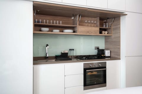 Apartment | Private kitchen | Full-size fridge, coffee/tea maker, electric kettle