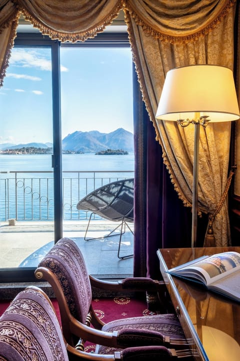 Senior Suite, lake view | Living area | Flat-screen TV