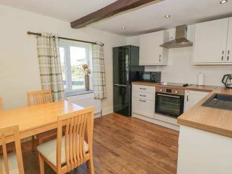 Fridge, electric kettle, toaster, cookware/dishes/utensils