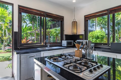 Electric kettle, highchair, cleaning supplies, paper towels