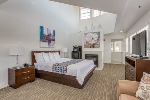 Standard Room, 1 King Bed, Partial Ocean View | Desk, laptop workspace, blackout drapes, iron/ironing board