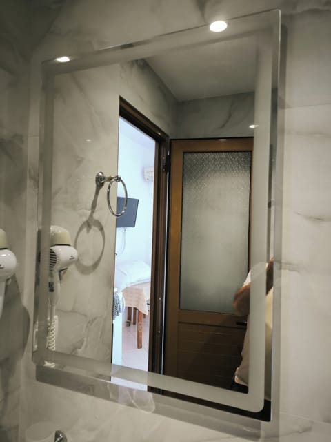 Shower, rainfall showerhead, hair dryer, soap