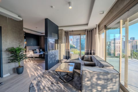Deluxe Suite | Premium bedding, minibar, desk, laptop workspace