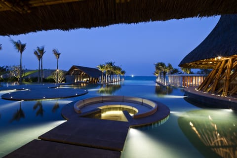 2 bars/lounges, poolside bar, beach bar