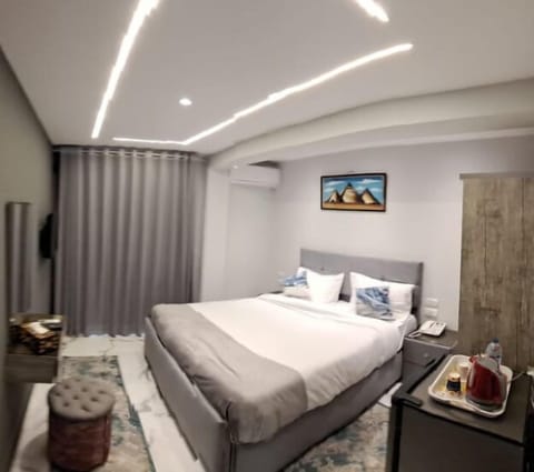 Deluxe Room, 1 Bedroom | Minibar, free WiFi, bed sheets