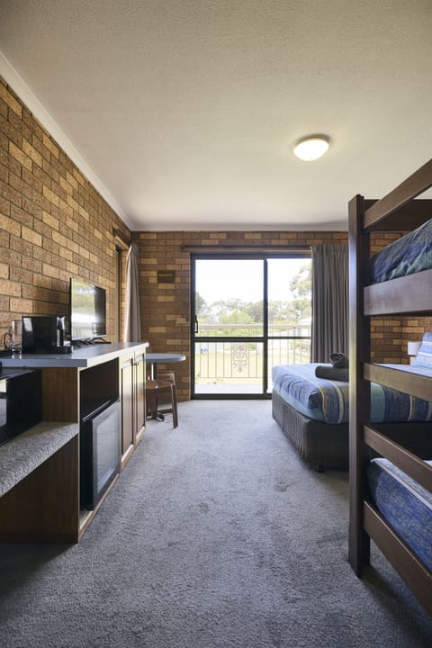 Family Room, Balcony (Standard Room - Family 4) | Free WiFi, bed sheets