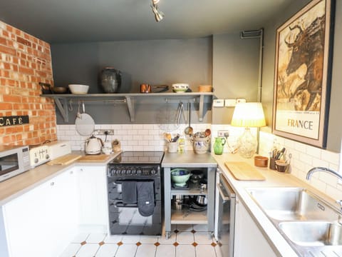 Fridge, dishwasher, electric kettle, cookware/dishes/utensils