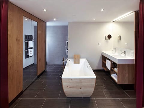 Suite, Balcony, Mountain View | Bathroom | Free toiletries, hair dryer, bathrobes, slippers