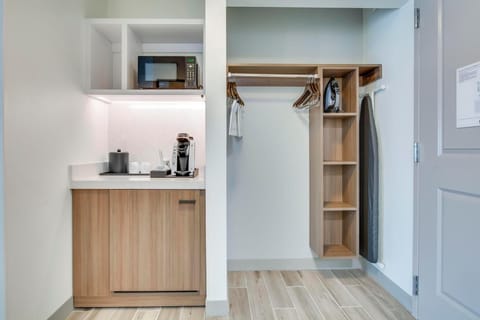 Desk, laptop workspace, blackout drapes, iron/ironing board