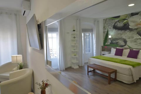 Standard Suite, City View | In-room safe, desk, soundproofing, iron/ironing board