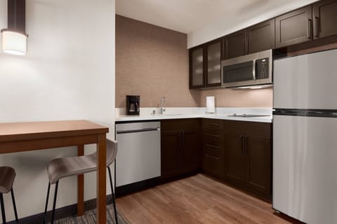 Studio, 1 King Bed | Private kitchen | Fridge, microwave, stovetop, dishwasher