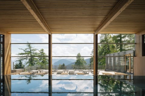 Indoor pool, open 7:00 AM to 10:00 PM, pool umbrellas, sun loungers