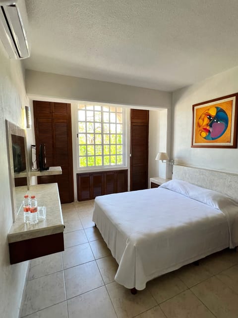 Presidential Suite, Balcony, City View | Desk, laptop workspace, blackout drapes, iron/ironing board