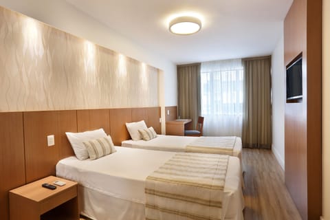Deluxe Room | Premium bedding, minibar, in-room safe, soundproofing