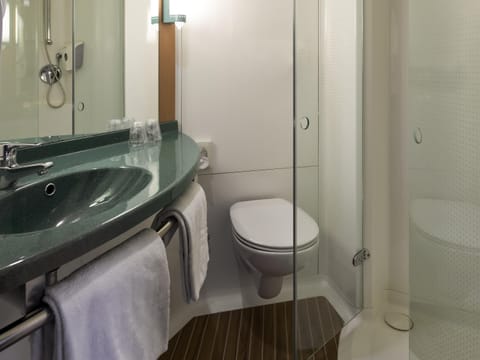 Room, 1 Twin Bed | Down comforters, desk, blackout drapes, iron/ironing board