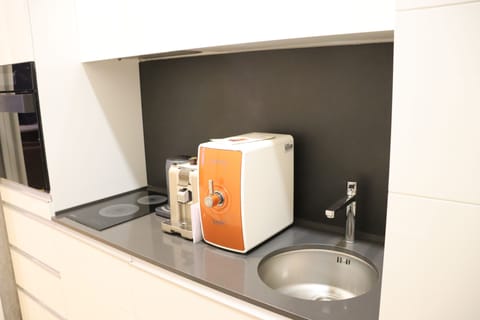 Grand Suite, 1 Bedroom | Private kitchen | Coffee/tea maker, electric kettle