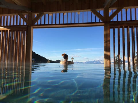 Indoor pool, pool umbrellas, sun loungers