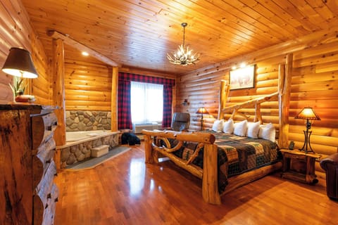 Suite, 1 King Bed, Non Smoking, Jetted Tub | Premium bedding, laptop workspace, blackout drapes, iron/ironing board