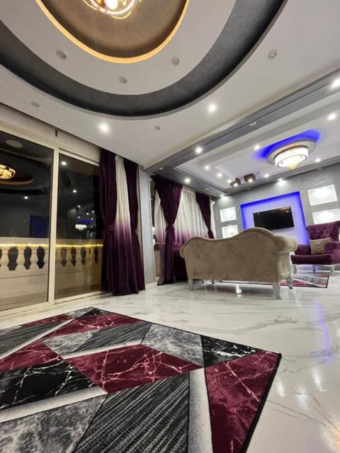 Deluxe Apartment | Living area | LCD TV