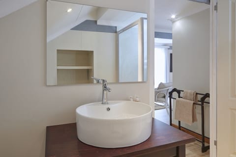 Yellow Aloe Family Rooms | Bathroom | Hair dryer, towels