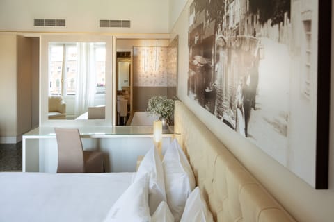 Junior Suite, Canal View | Down comforters, minibar, in-room safe, free WiFi