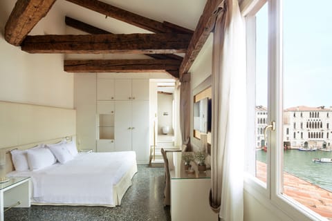 Premium Room (Partial Canal View) | Down comforters, minibar, in-room safe, free WiFi