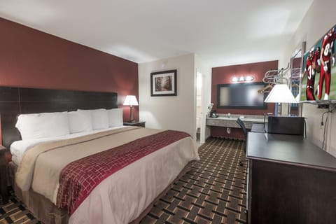 Superior Room, 1 King Bed, Smoking | Desk, laptop workspace, blackout drapes, free cribs/infant beds