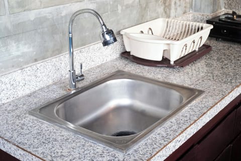 Microwave, cookware/dishes/utensils, dining tables