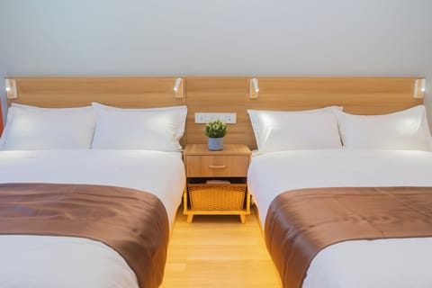 Deluxe Two Queen Bed Room with Kitchenette (Brand New) | Egyptian cotton sheets, premium bedding, desk, laptop workspace