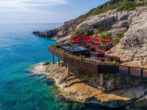 11 bars/lounges, poolside bar, beach bar