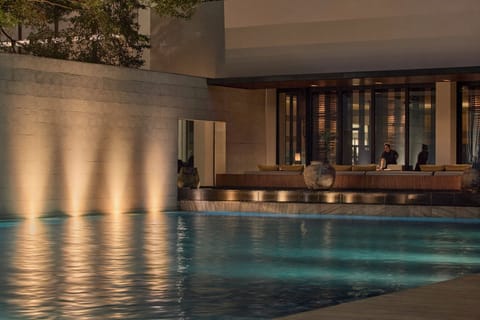 Outdoor pool, open 7 AM to 8 PM, pool umbrellas, sun loungers